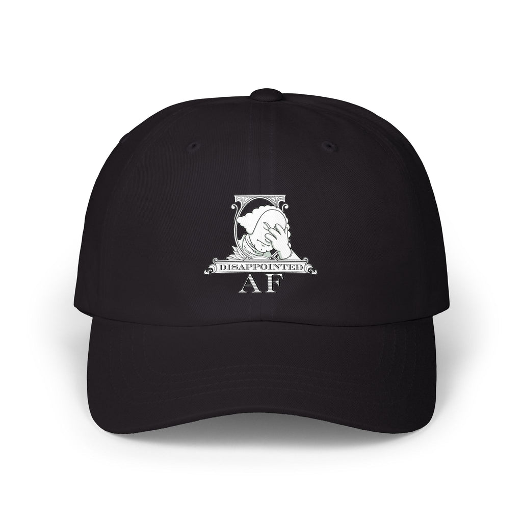 A black baseball cap with a white graphic on the front depicting Disappointed AF's logo. The logo is framed with scrolls, similar to that of a dollar bill, with George Washington in the center. George Washington looks disappointed and has his head in his hand.