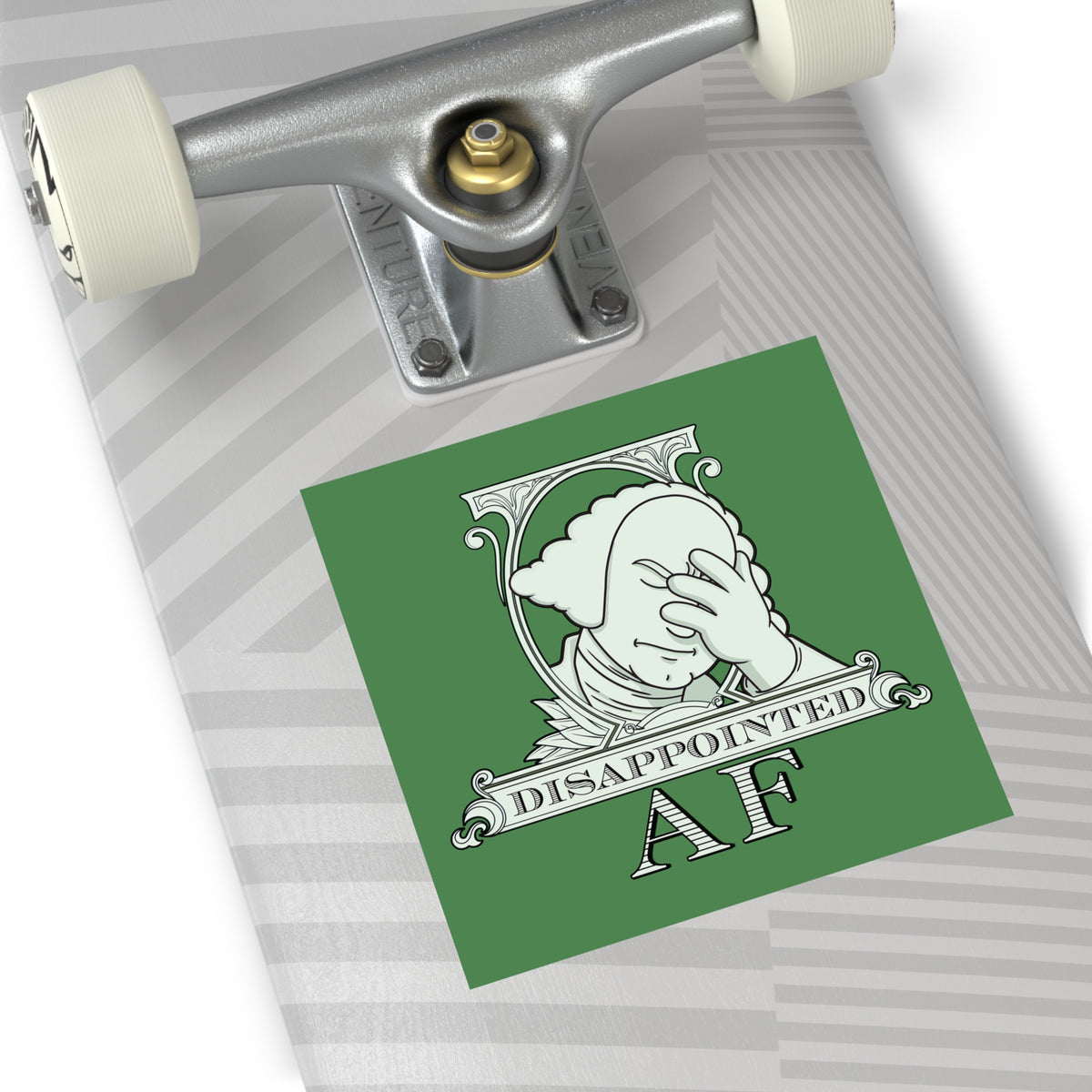 A square political sticker featuring a pale green illustration of the logo for Disappointed AF installed on the bottom of a skateboard. The logo is white on a green background and framed with scrolls, similar to that of the dollar bill. George Washington's bust is in the center looking disappointed, his head leaning forward out of the scrolled framing, with his head in his hand and an exasperated look on his face. Below the figure it says Disappointed AF.