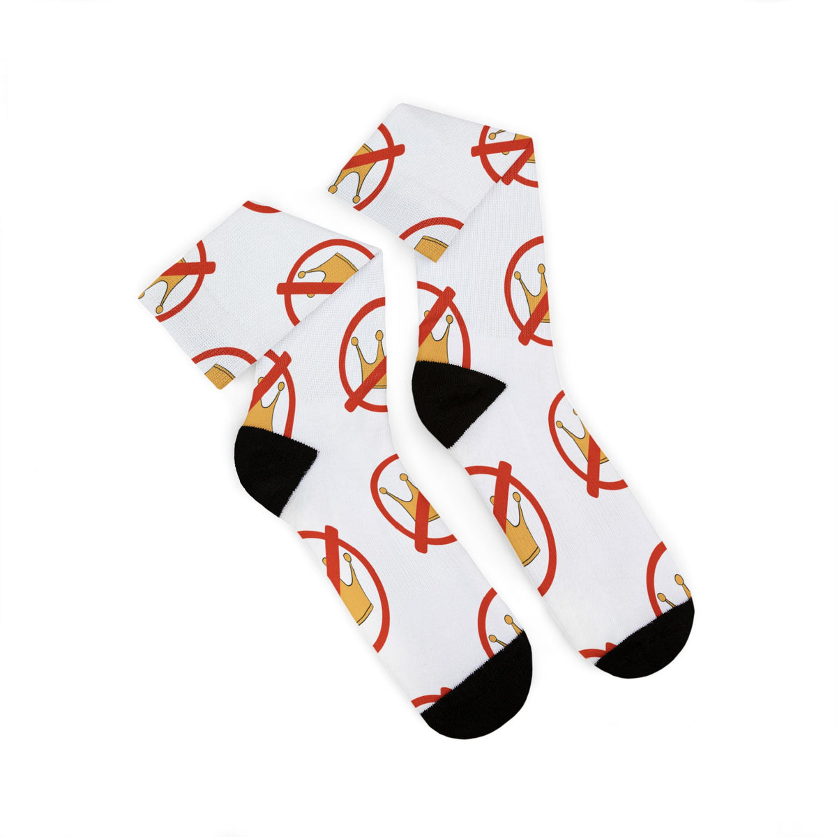 A pair of crew socks worn on legs, featuring a white ribbed base with a repeating graphic of a gold crown inside a red prohibition symbol, finished with black heels and toes.