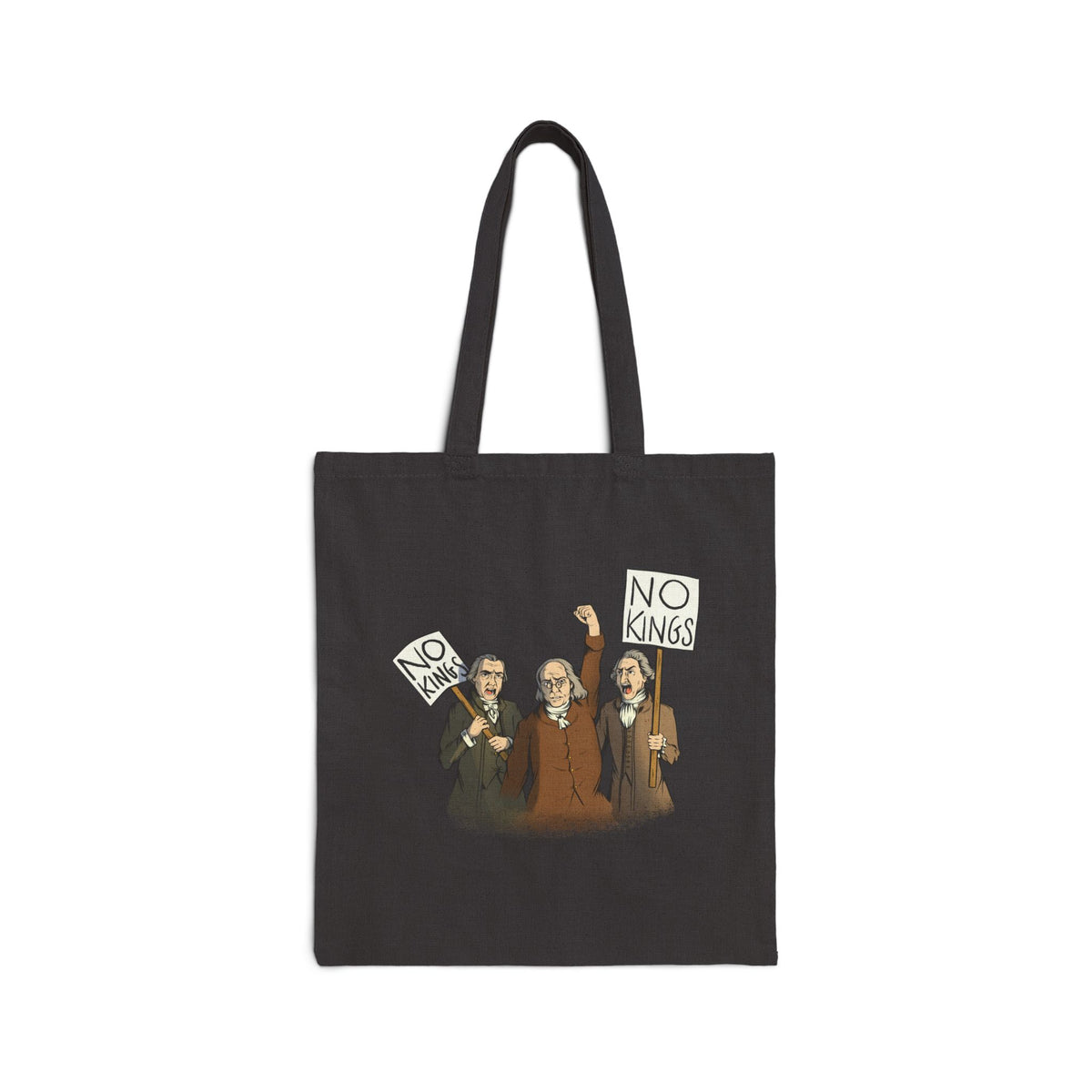 An black canvas tote bag with two straps and a graphic on a plain white background. The bag has a printed illustration of three Disappointed American Founders protesting and holding 'NO KINGS' signs.