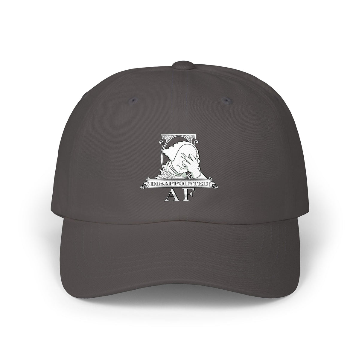 A dark grey baseball cap with a white graphic on the front depicting Disappointed AF's logo. The logo is framed with scrolls, similar to that of a dollar bill, with George Washington in the center. George Washington looks disappointed and has his head in his hand.