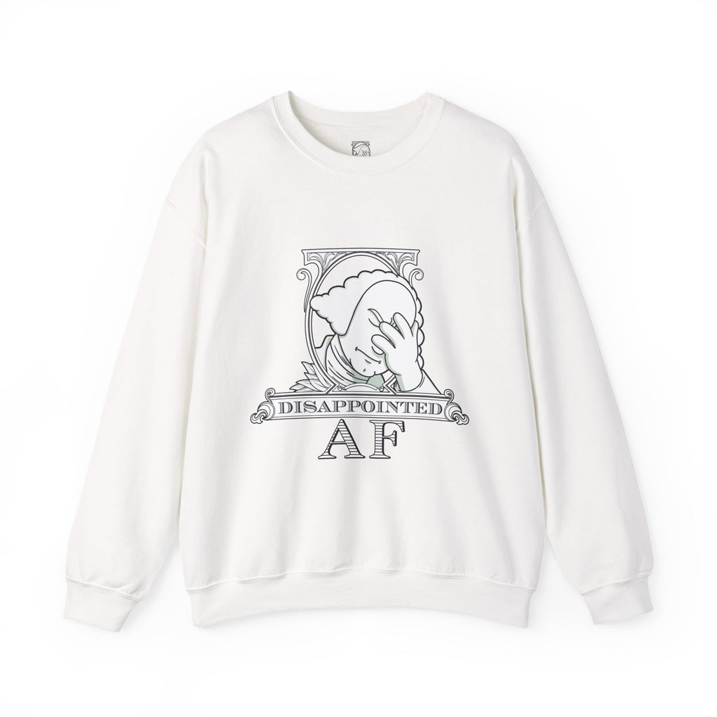 A white, long-sleeved sweatshirt with a graphic in the center on a white background. This graphic is the logo for Disappointed AF and is framed with scrolls, similar to that of a dollar bill, with George Washington in the center. George Washington looks disappointed and has his head in his hand. below the logo it says Disappointed AF