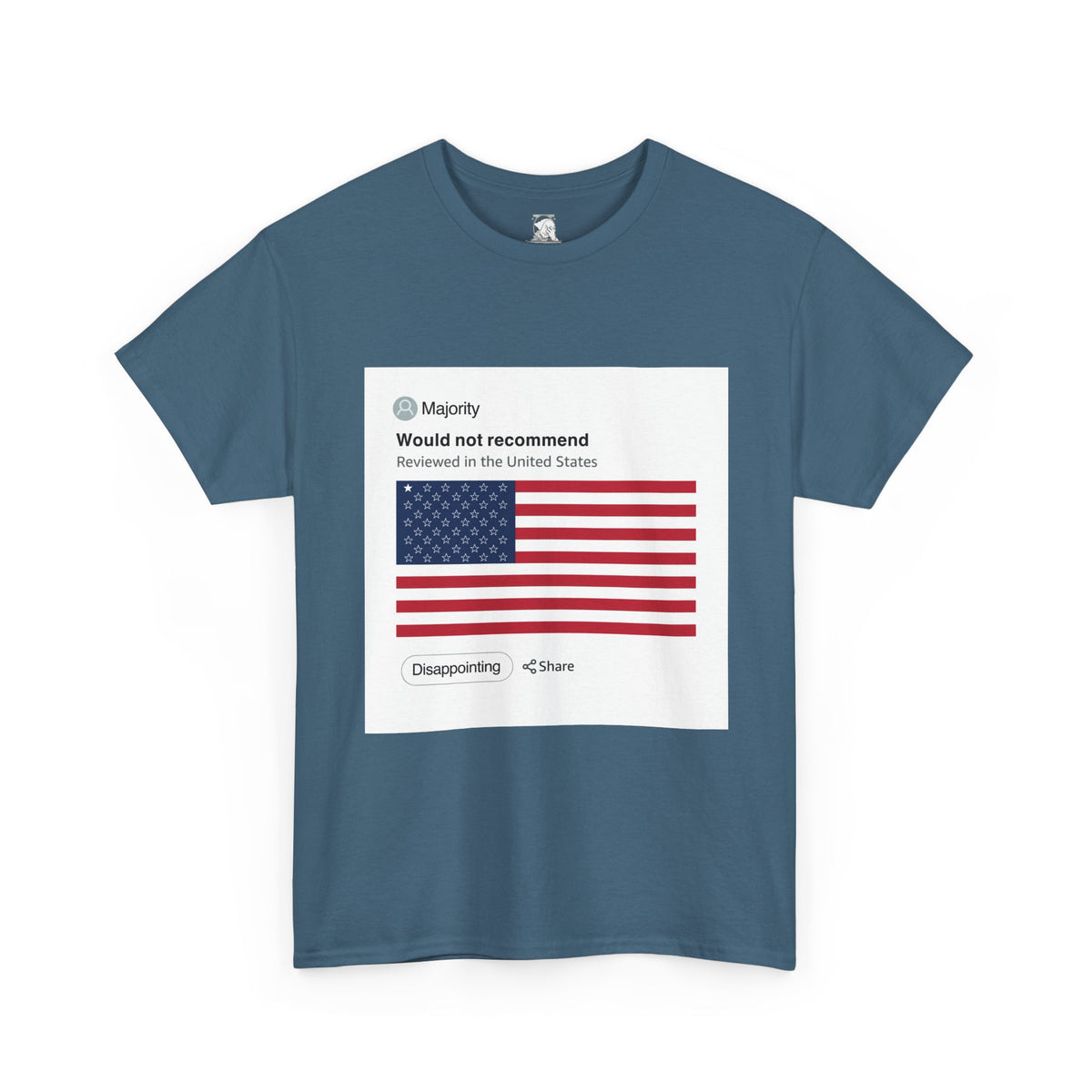 A slate blue, short-sleeve crewneck t-shirt featuring a graphic print imitation of an Amazon review on a white background. At the top of the review is the word "Majority," which is meant to be a username leaving the review. Below that is the review, which reads "Would not recommend, reviewed in the United States." Below the reviews is an America flag with 49 stars merely outlines, and only one star filled in completely with white, imitating a one-star review of the United States as a country.
